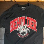 A tee short sporting "Beholder" in giant letters. An image of the monster, a floating eyeball with a massive jaw and several eye stalks, is underneath.