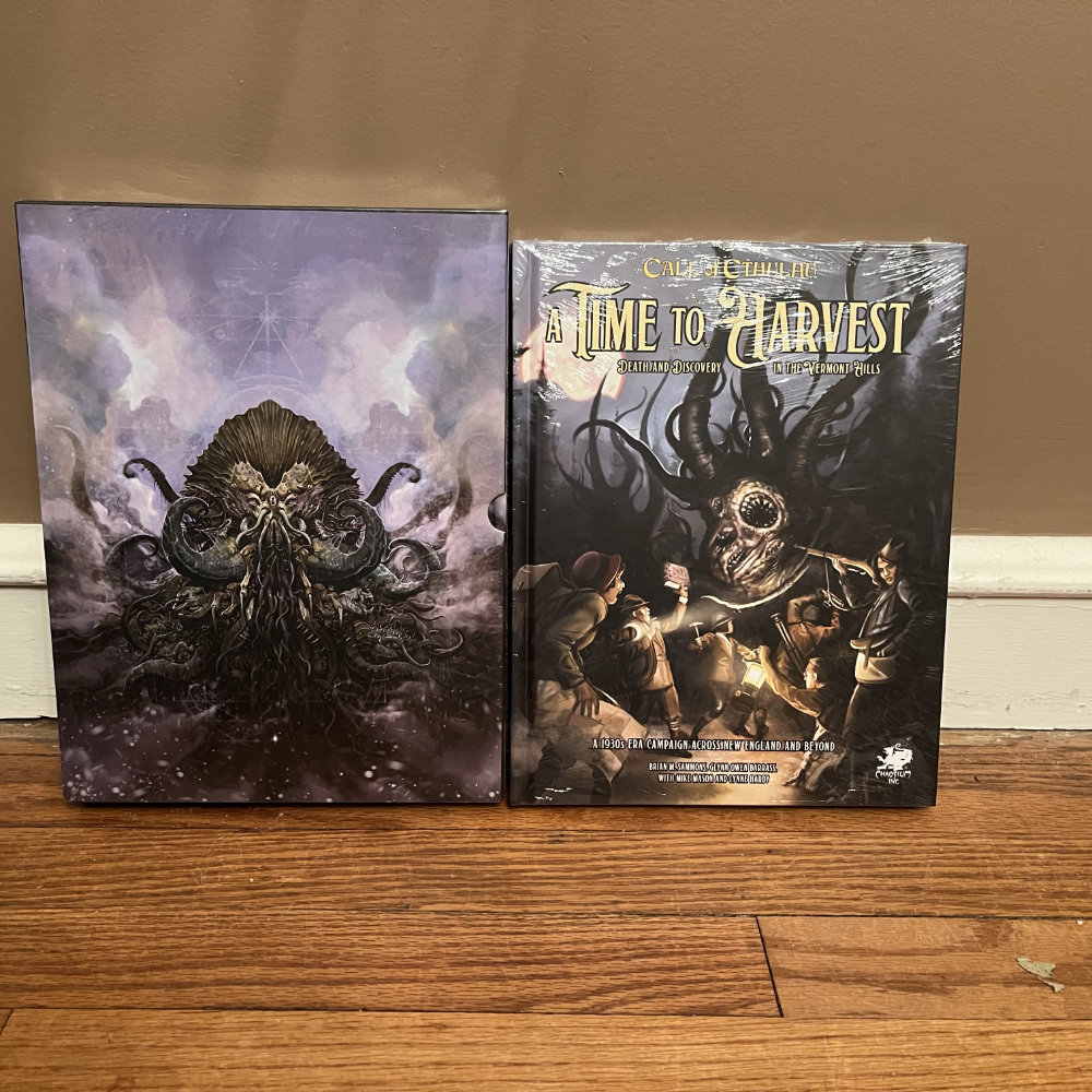 Malleus Monstrorum and A Time to Harvest standing against a wall.