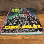 Neon Lords of the Toxic Wasteland "Core Rulez" - an armored man is wearing 3d glasses on the cover.