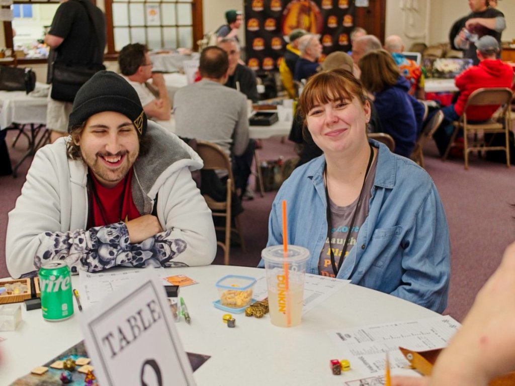 Happy players smile on camera.