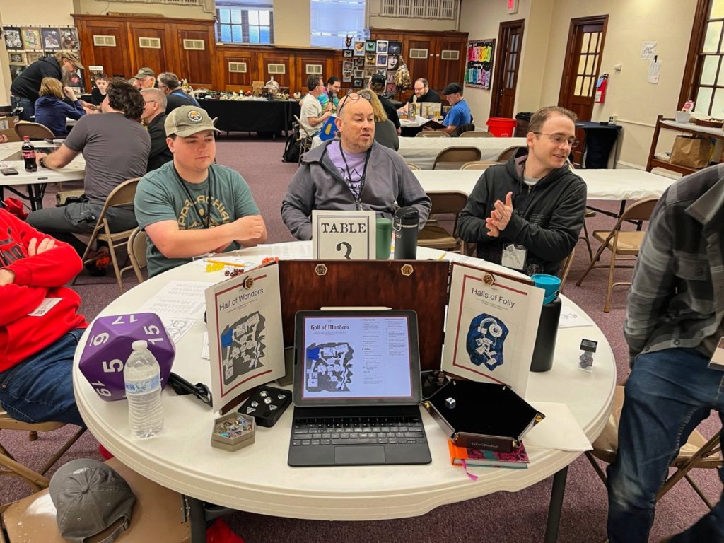 3 hapless players, who can't see the maps to their doom because they are hanging on the other side of the GM screen.