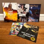 Free RPG Day adventures featuring Land of Myth, Outbreak: Undead, Intro Guide, Swords of the Serpentine, Torg Eternity, and Overlight