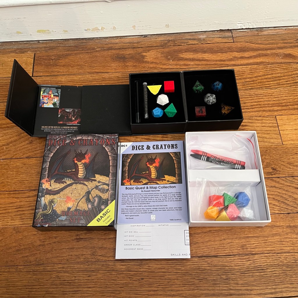 The D&D anniversary dice opened, above, revealing the two sets included in the product.